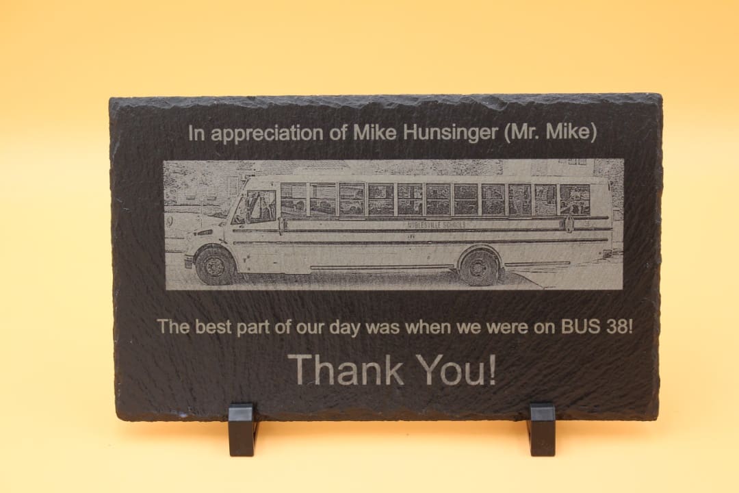 A bus driver 's plaque with the message " thank you ".